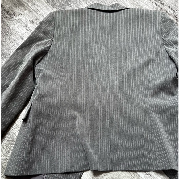 Blazer. New. Has shoulder pads. Larger fit on shoulders. Grey with stripes. - Picture 10 of 10
